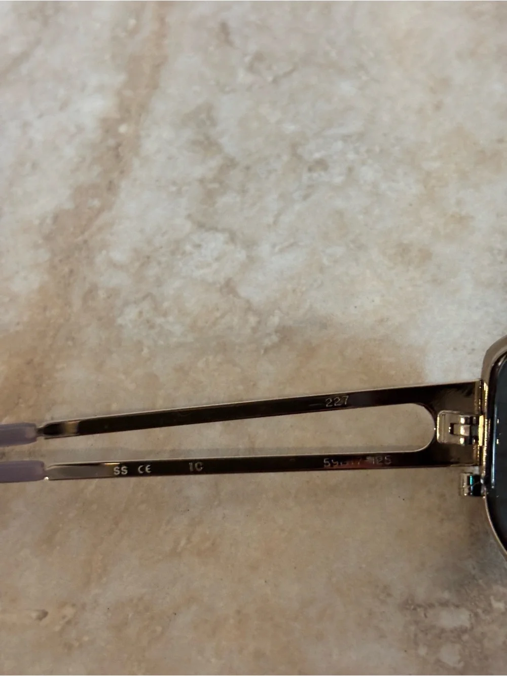 Hiero Elongated Oval Sleek Silver Frame Sunglasses with Dark Lenses